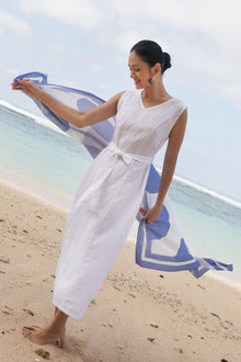 Woman wearing the Eva Linen Midi Dress White designed for effortless resortwear and tropical living by By The Sea Bali