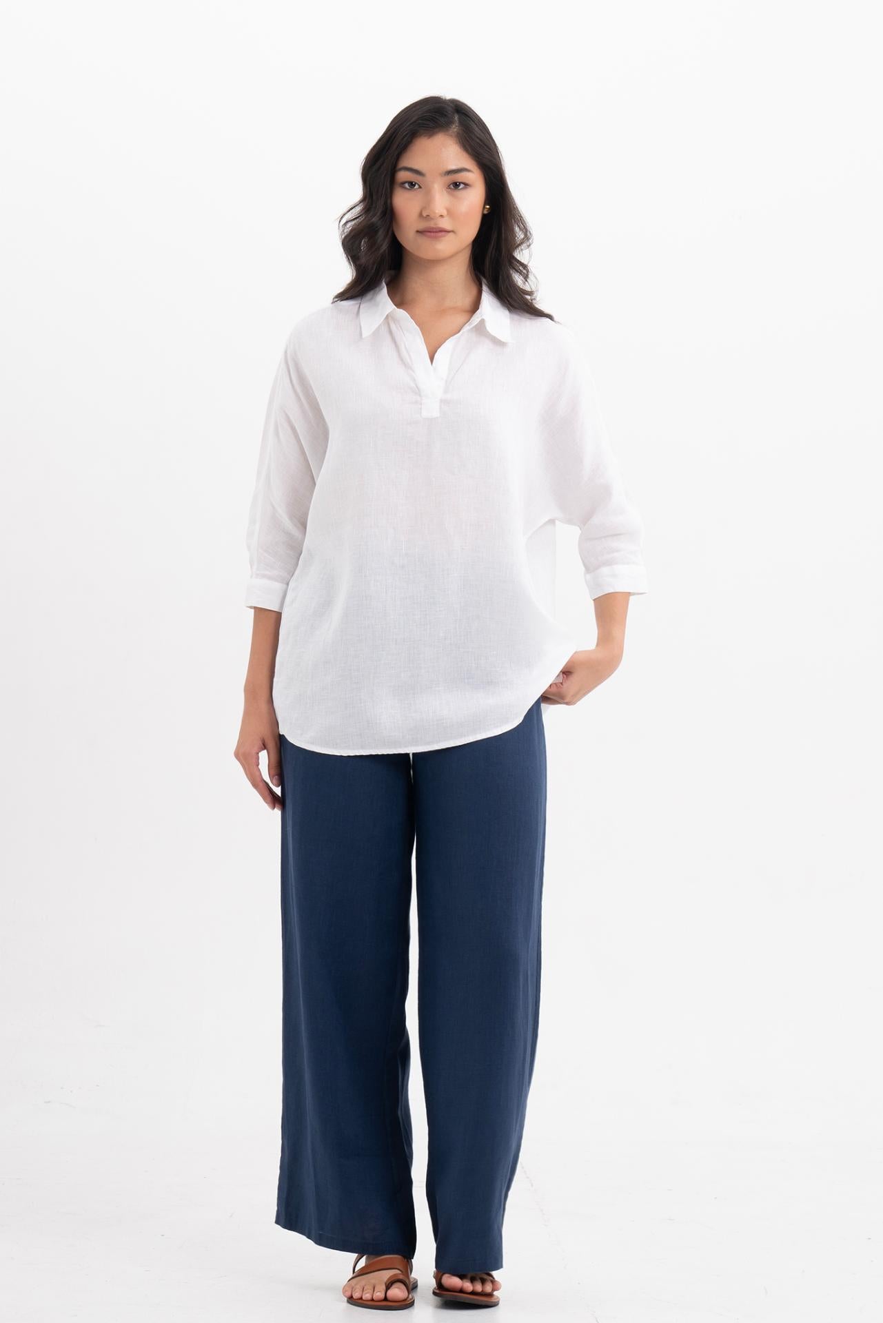 Front view of the Faye Linen Shirt White showcasing its silhouette and relaxed fit.