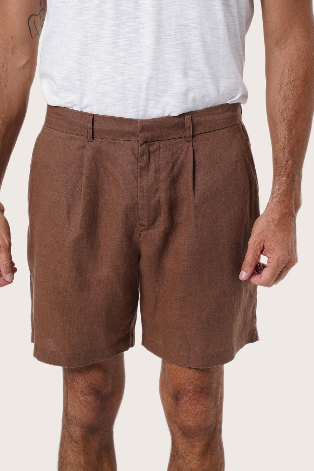 Side view of the Gaara Linen Bermuda in Brown highlighting the tailored fit by By The Sea Bali