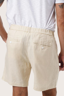 Waistband and pocket detail of the Cream Gaara Linen Bermuda by By The Sea Bali