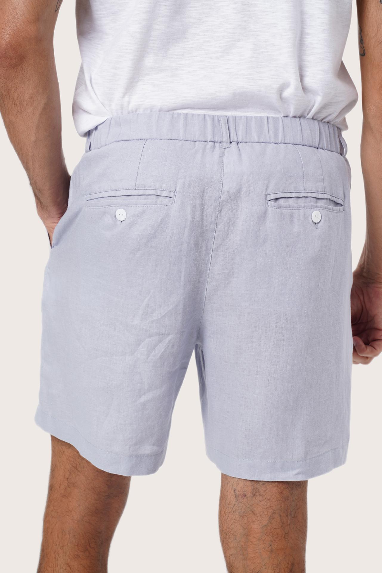 Waistband and pocket detail of the Light Blue Gaara Linen Bermuda by By The Sea Bali