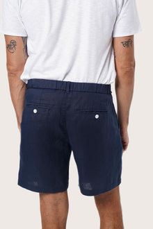 Waistband and pocket detail of the Navy Gaara Linen Bermuda by By The Sea Bali