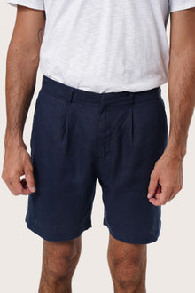 Side view of the Gaara Linen Bermuda in Navy highlighting the tailored fit by By The Sea Bali