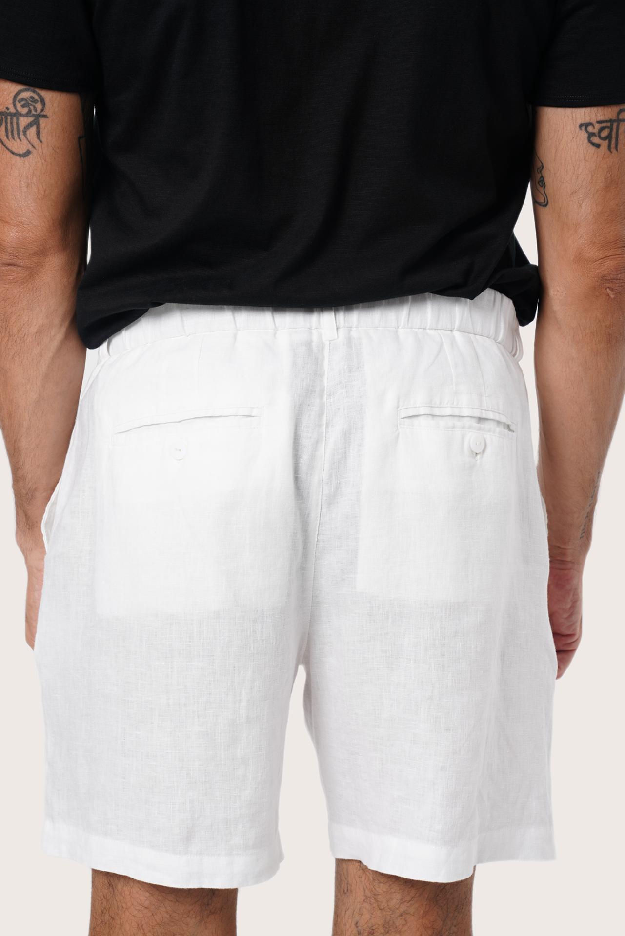 Men's resortwear styling featuring the Gaara Linen Bermuda in Off White by By The Sea Bali