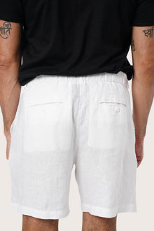 Men's resortwear styling featuring the Gaara Linen Bermuda in Off White by By The Sea Bali