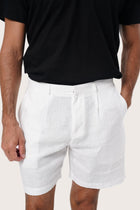 Side view of the Gaara Linen Bermuda in Off White highlighting the tailored fit by By The Sea Bali
