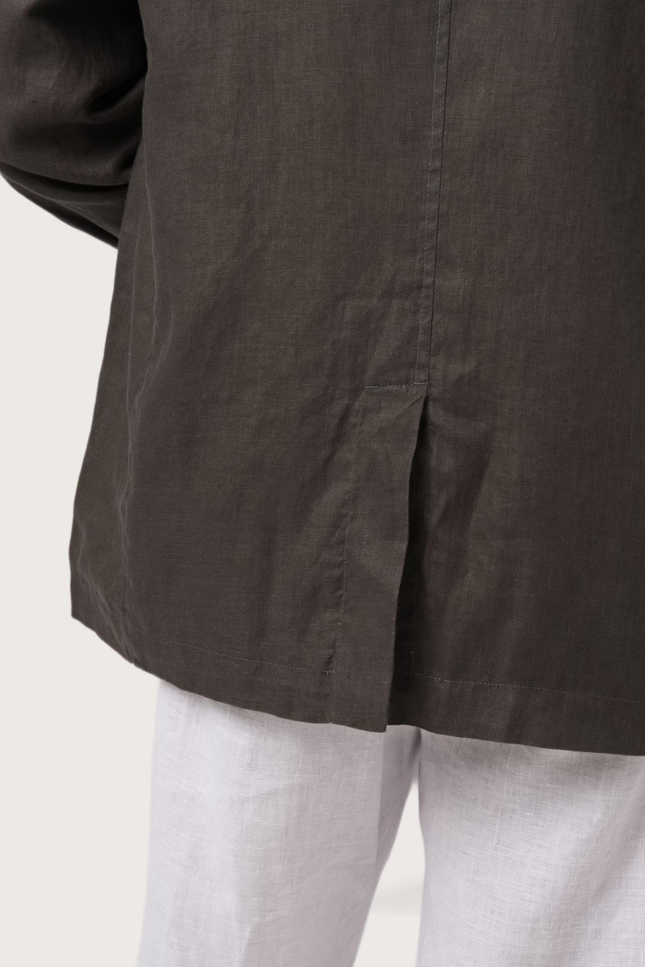 Detailed back view highlighting the linen construction and relaxed silhouette