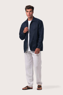 Model wearing the navy linen Gaung jacket by By The Sea Bali