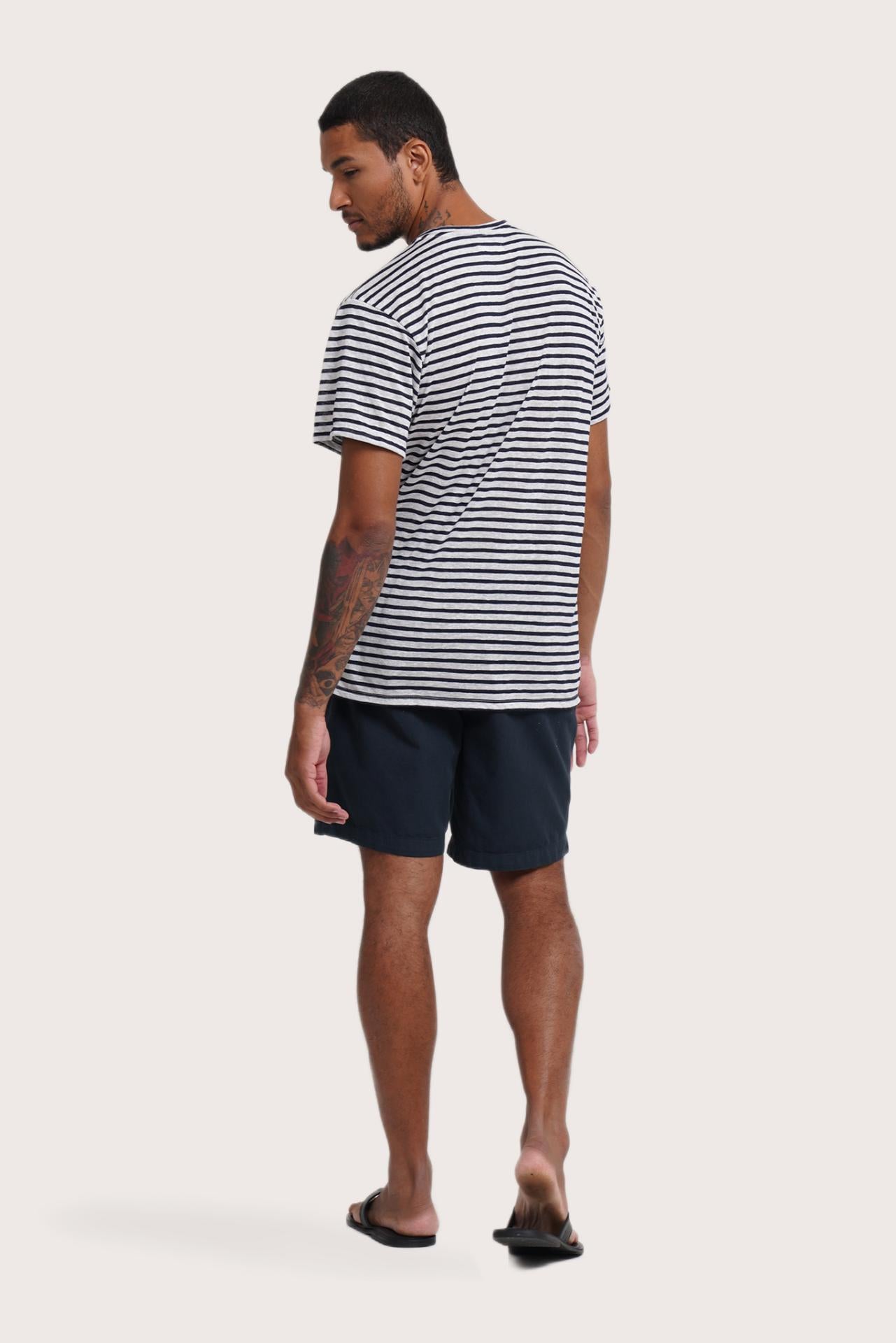 Back view of the By The Sea Bali Geva T-shirt Stripe in Navy – clean tailoring and refined craftsmanship