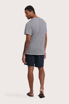 Back view of the By The Sea Bali Geva T-shirt Stripe in Navy – clean tailoring and refined craftsmanship