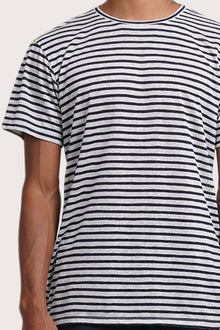 Close-up of the Geva T-shirt Stripe in Navy by By The Sea Bali – exceptional fabric quality and texture