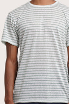 Close-up of the Geva T-shirt Stripe in Paste Green by By The Sea Bali – exceptional fabric quality and texture