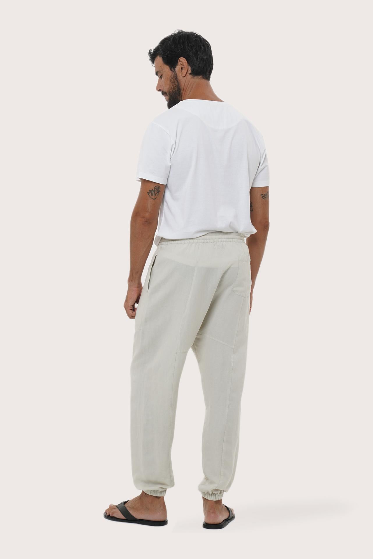 Back view of the ivory linen rayon loose pants with a relaxed and flowing silhouette