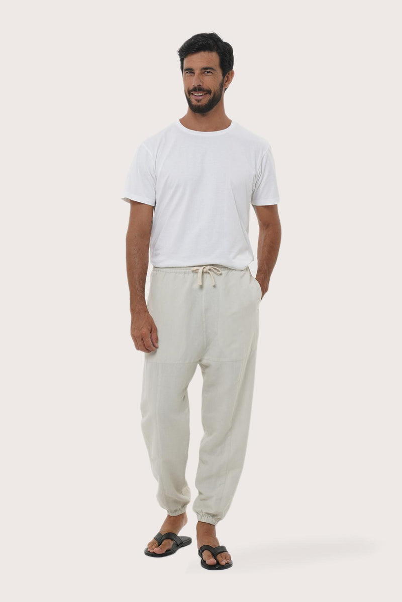 Model wearing the ivory linen rayon Goa loose pants by By The Sea Bali