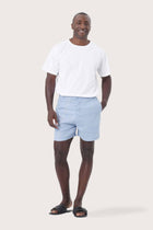 Model wearing the blue linen Gowa shorts by By The Sea Bali