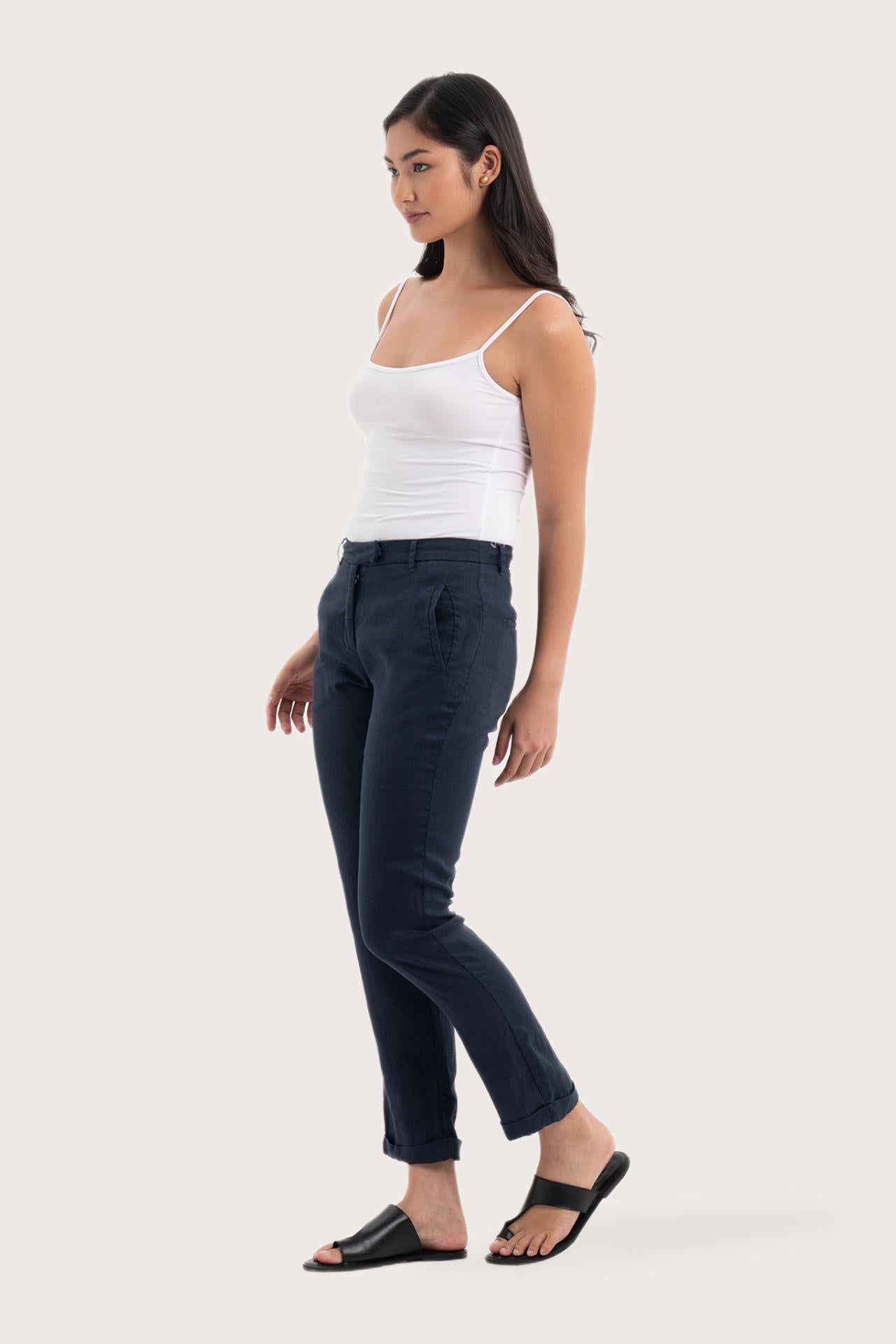 Side profile of the Hampton Women's Linen Pants Navy showing its cut and natural movement.