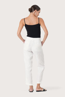 Back view of the Hampton Women's Linen Pants Off White highlighting the garment shape and drape.