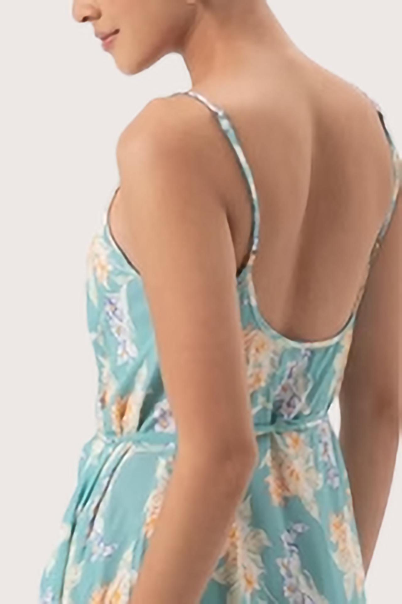 Close up detail of the Ilona Wrapped Dress Tosca Green highlighting craftsmanship and design features