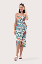 Woman wearing the Ipanema printed midi dress designed for effortless resortwear and tropical living by By The Sea Bali