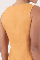 Close up detail of the Isla Linen Dress Orange  highlighting craftsmanship and design features