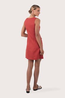 Back view of the Isla Linen Dress Red highlighting the garment shape and drape