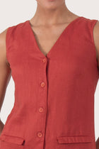 Close up detail of the Isla Linen Dress Red  highlighting craftsmanship and design features