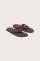 Jaco sandal in brown front view showcasing elegant straps and minimalist resort aesthetic