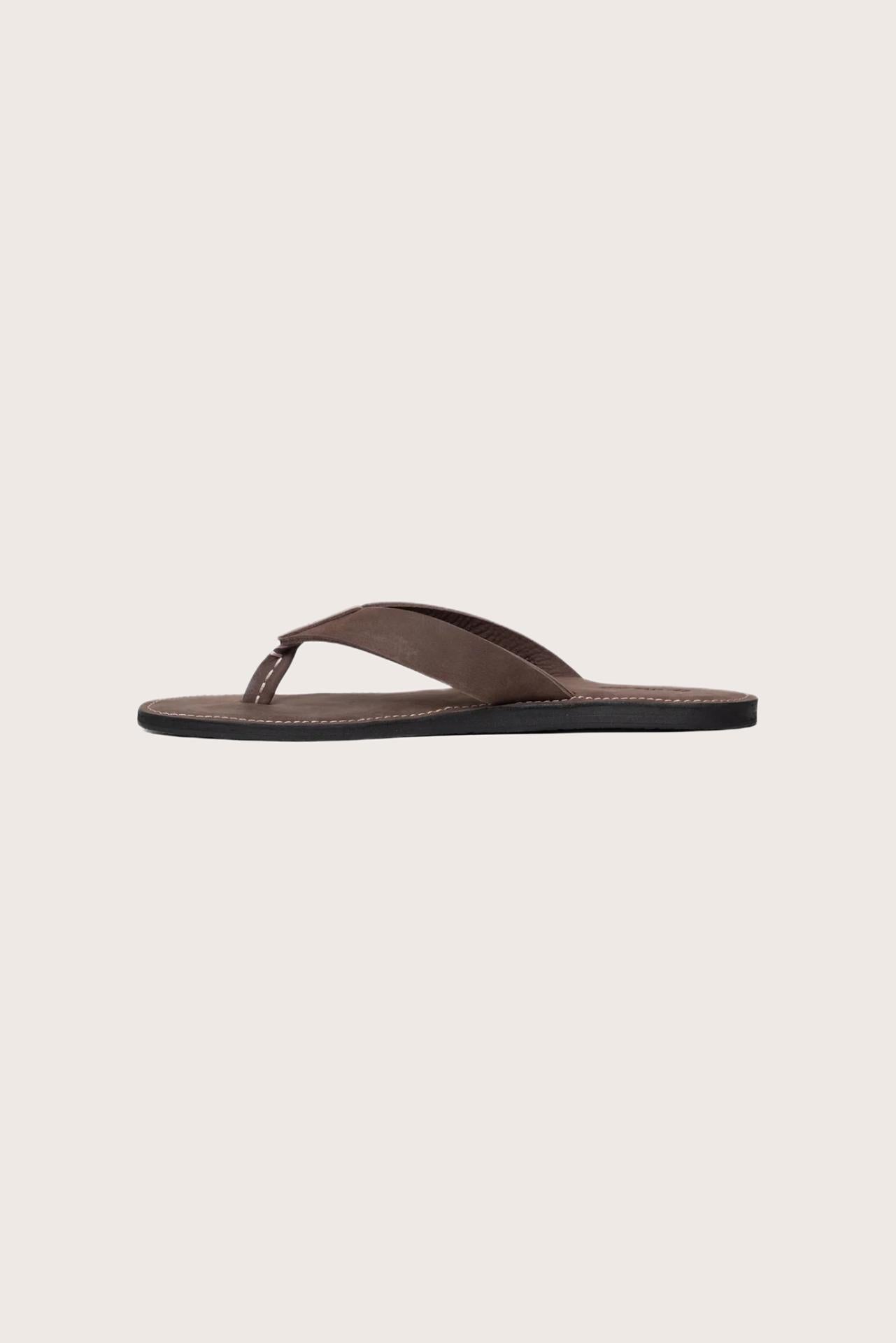 Side profile of Jaco sandal in brown highlighting sleek and modern resort footwear silhouette