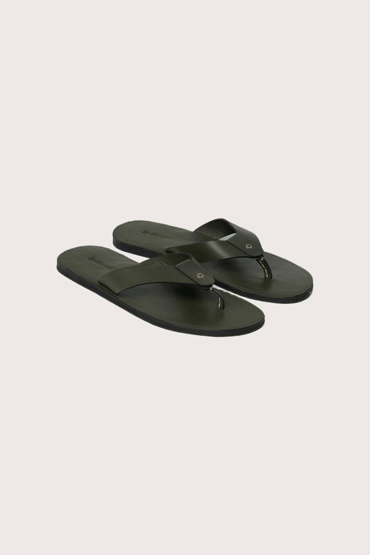 Jaco sandal in forest green front view showcasing elegant straps and minimalist resort aesthetic