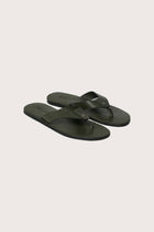 Jaco sandal in forest green front view showcasing elegant straps and minimalist resort aesthetic