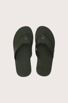 Jaco sandal in forest green shown in a global view highlighting its full silhouette and refined resort design