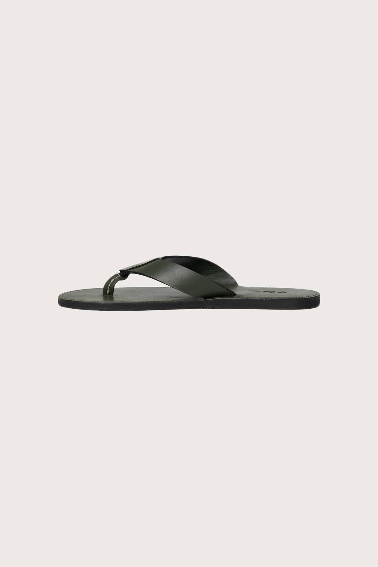 Side profile of Jaco sandal in forest green highlighting sleek and modern resort footwear silhouette