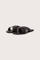 Jey sandal in cioccolato fondente front view showcasing elegant straps and minimalist resort aesthetic