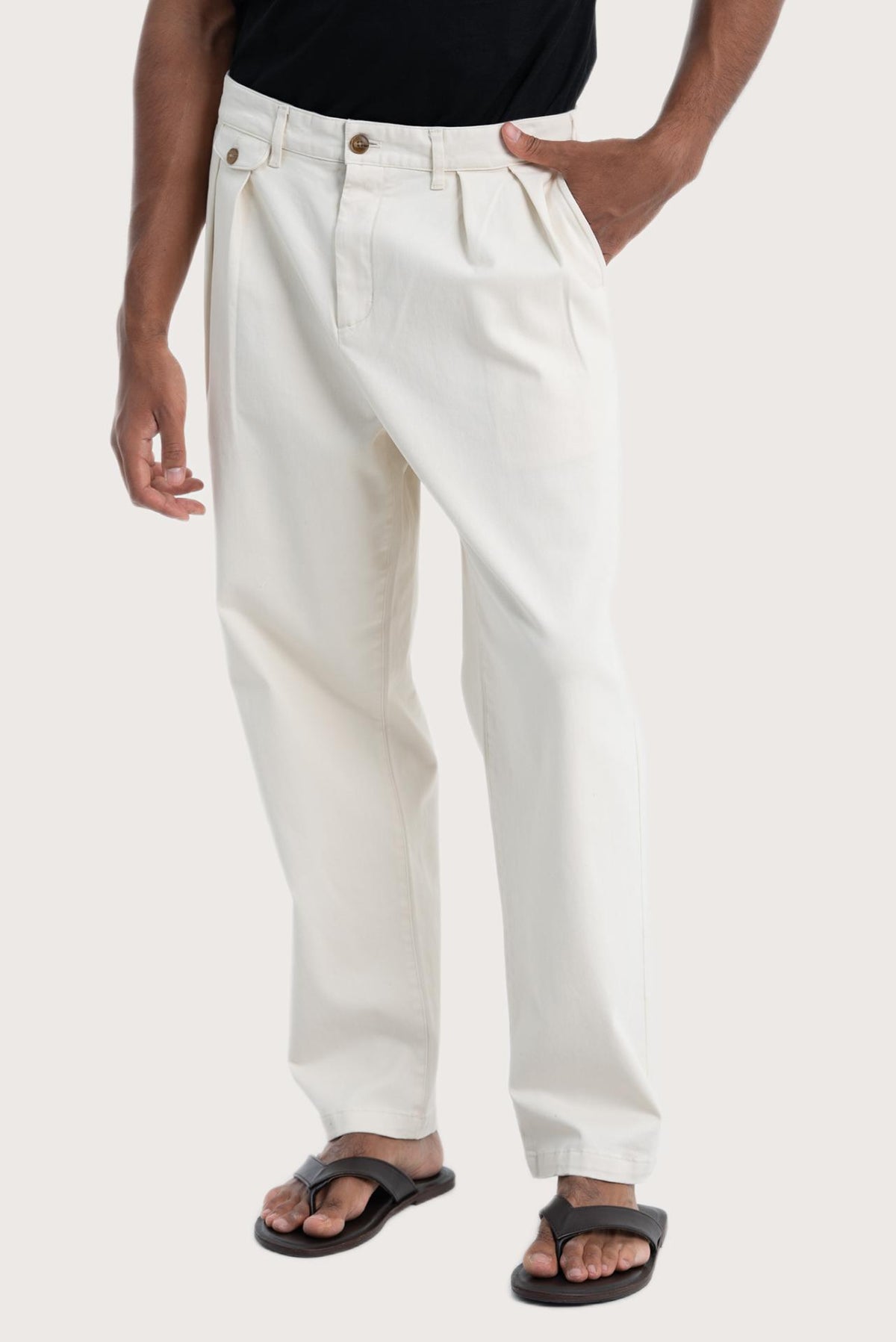 Close-up of the creme Joey Pant fabric and design details