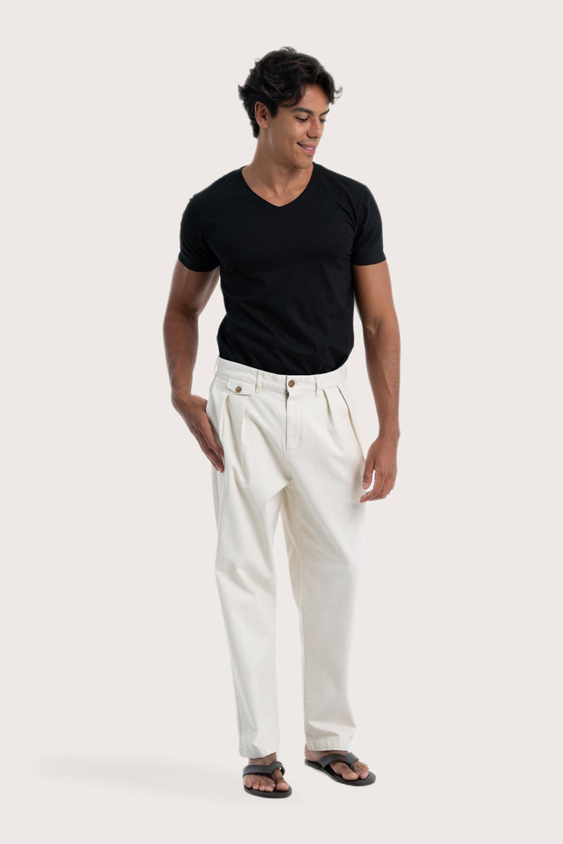 Side view of the creme Joey Pant showcasing its silhouette