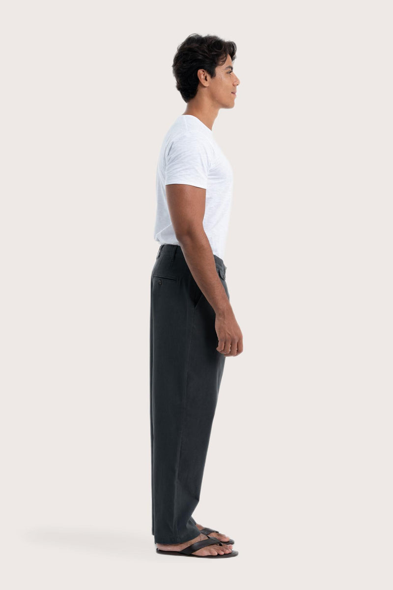 Side view of the dark grey Joey Pant showcasing its silhouette