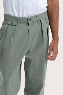 Close-up of the grey green Joey Pant fabric and design details