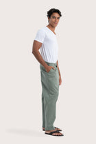Side view of the grey green Joey Pant showcasing its silhouette