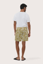 Close-up of the Summer in Island print on the Army Juan Bermuda Shorts by By The Sea Bali