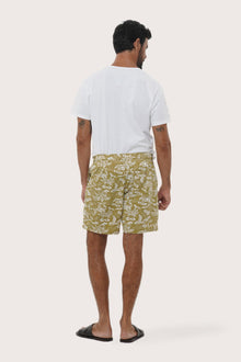 Close-up of the Summer in Island print on the Army Juan Bermuda Shorts by By The Sea Bali