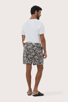 Close-up of the Summer in Island print on the Brown Juan Bermuda Shorts by By The Sea Bali