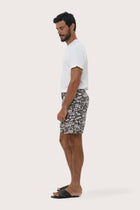 Front view of the Juan Bermuda Shorts in Summer in Island Brown print by By The Sea Bali