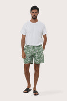 By The Sea Bali Juan Bermuda Shorts in Summer in Island Sage — tailored tropical-print shorts for easy summer days