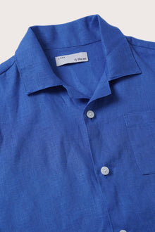 Sophisticated resort styling featuring the Kai Linen Shirt in Blue