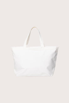 Back view of the Kaia Bag White highlighting its clean lines and artisanal craftsmanship