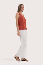 Lightweight linen tanktop designed for refined tropical dressing
