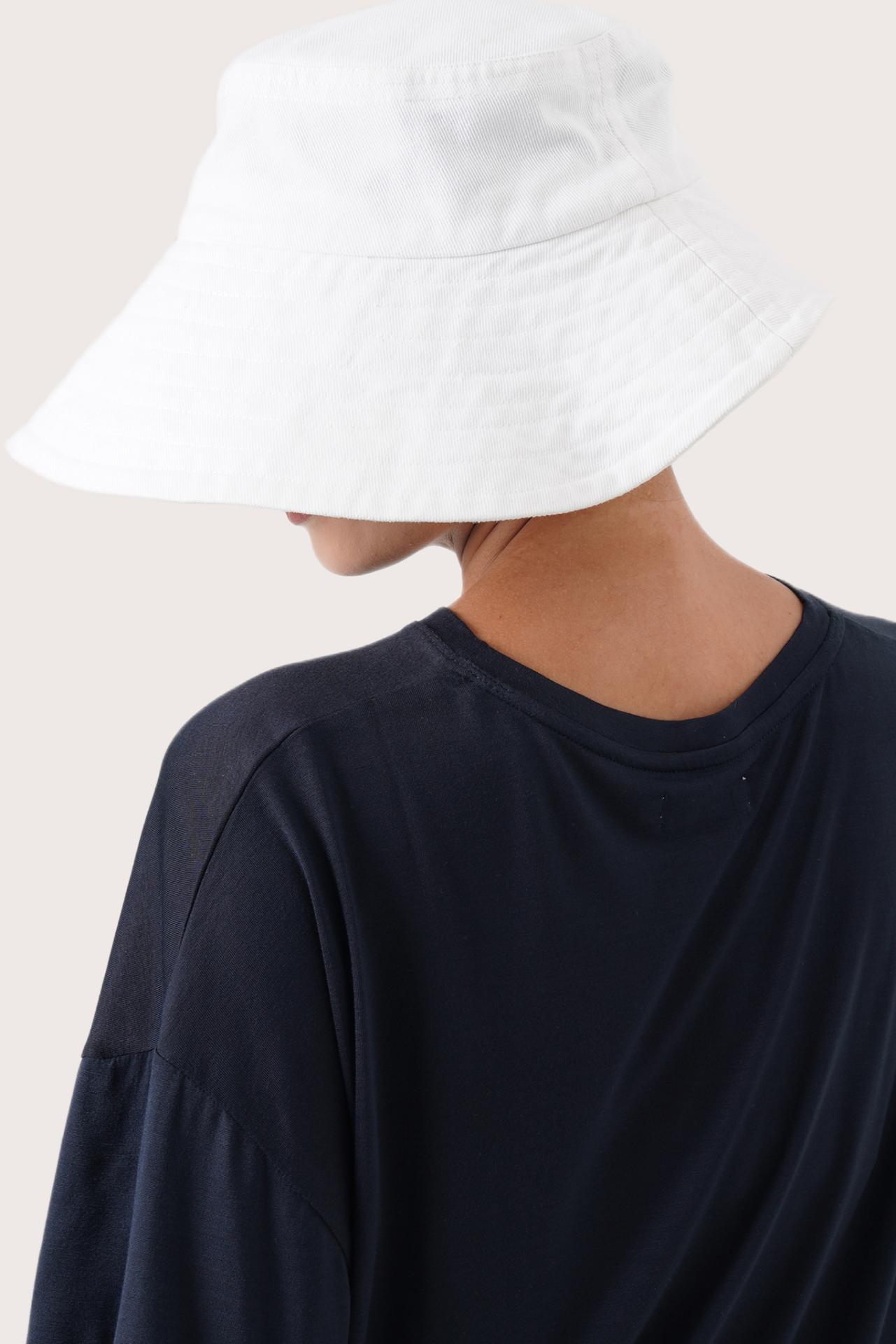 Back view of the Kalulla Cotton Hat Off White showcasing its lightweight design and refined finish
