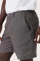 Close-up texture of the breathable linen fabric and premium craftsmanship
