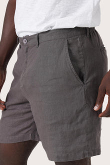 Close-up texture of the breathable linen fabric and premium craftsmanship
