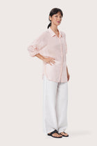By The Sea Bali Side profile of the Kami Shirt showcasing its relaxed fit and fluid drape
